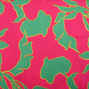 Crêpe satin polyester imprimé feuilles turquoise fond fuchsia
