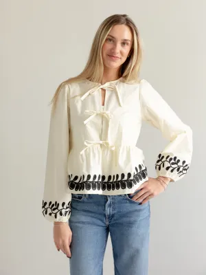 Anti Pill Finish Cozy Knit Embroidered Peplum Bow Blouse