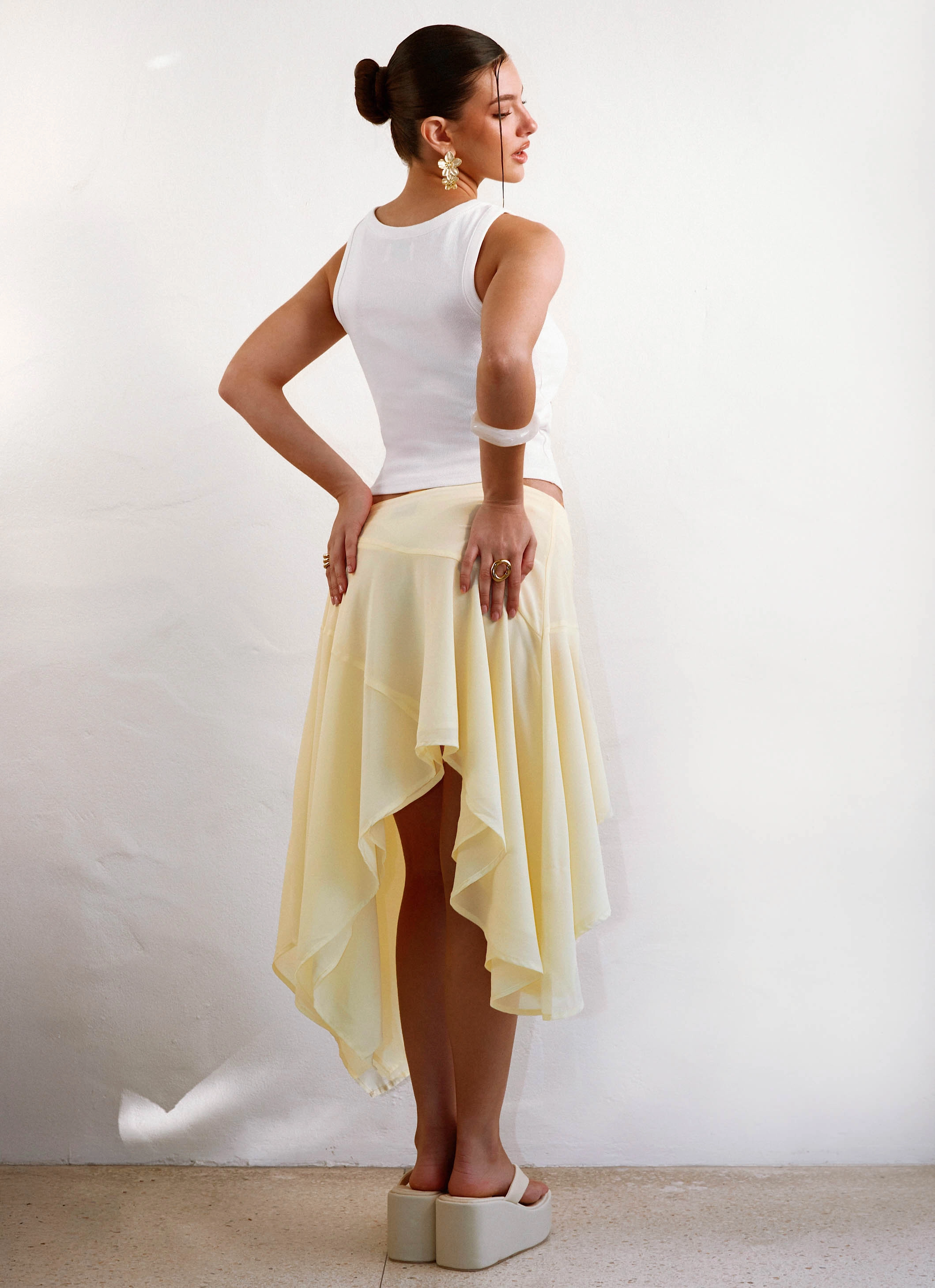 Casual Feel Faux Leather Kia Low Rise Asymmetrical Midi Skirt - Yellow