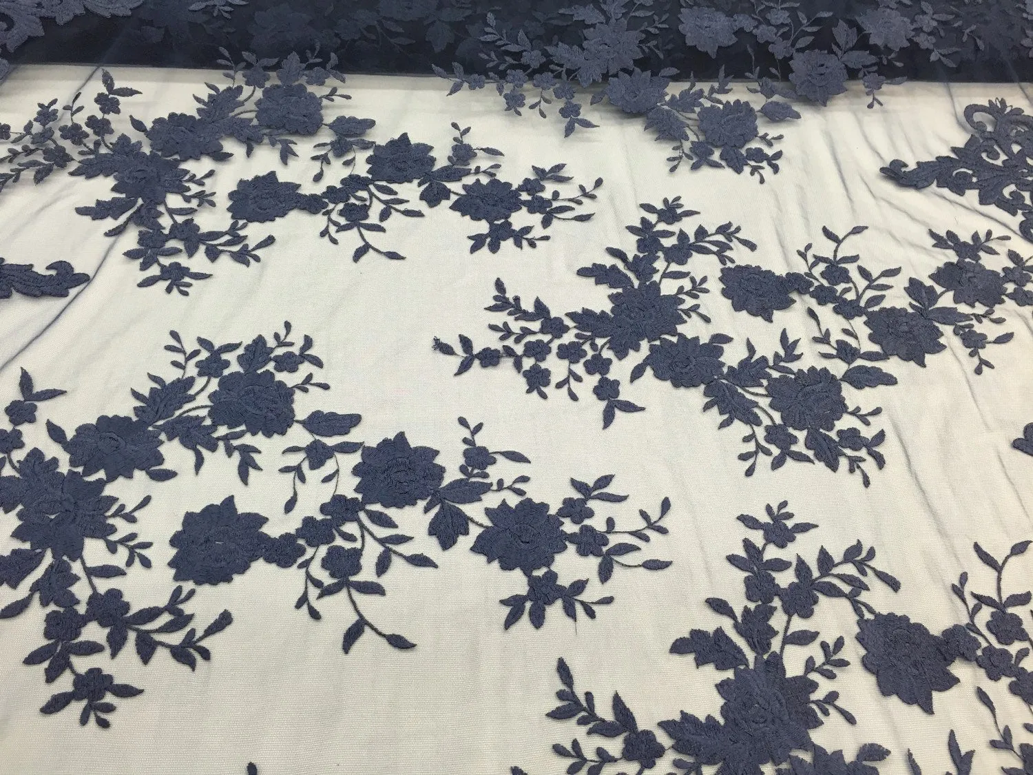 Navy blue flowers embroider on a 2 way stretch mesh lace. Wedding/Bridal/Prom/Nightgown fabric. Sold by the yard.